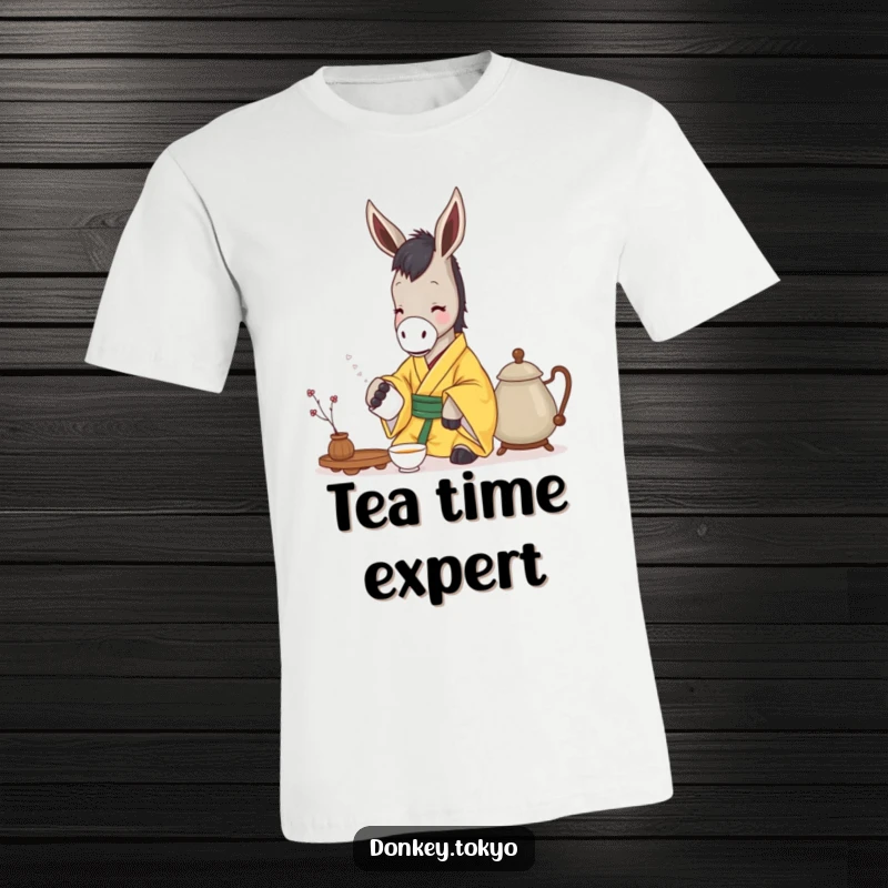 Funny donkey in a yellow kimono gently pouring tea, featured on a t-shirt for a serene and humorous look.